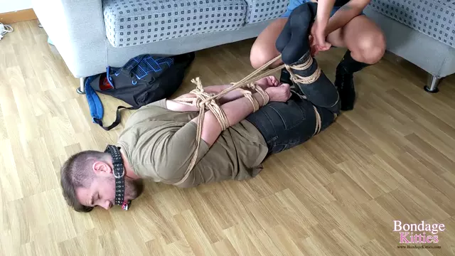 Poster: BONDAGEKITTIES - (Spanish) - Man Hogtied And Tied In Chair By Lex