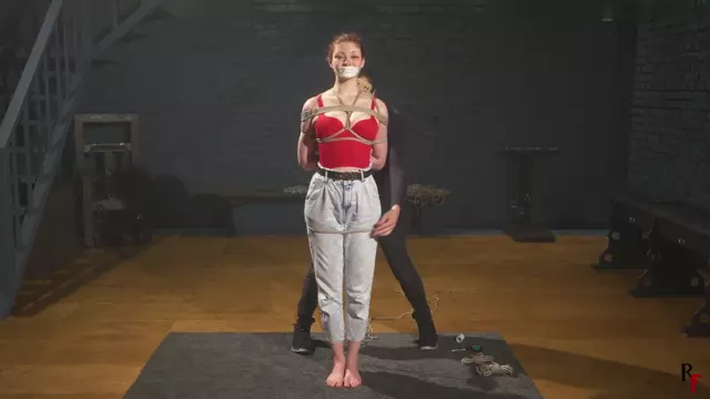 Poster: Redheaded Emily – Tight Rope Hogtie for Barefoot Beauty