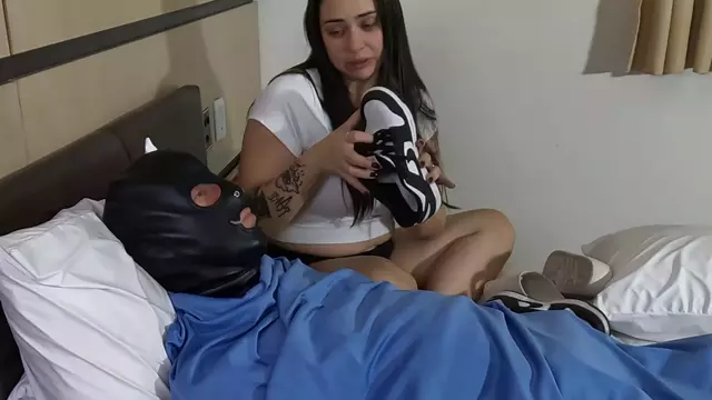 Poster: SOLES AND FOOT FETISH - BELLATRIX PUNISHING HER MALE SLVE BY ORDERING HIM SNIFF AND LICK HER SNEAKERS SLIPPERS AN SOCKS